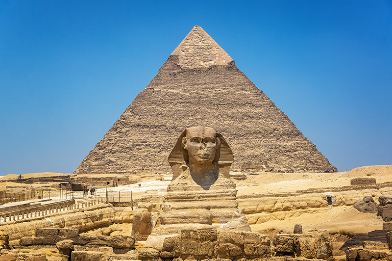 Great Sphinx of Giza and the Pyramid of Khafre located on the Giza Plateau in Egypt